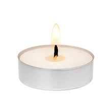 A lit unscented white tealight candle in aluminum cup